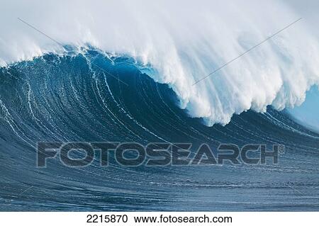 Stock Image - Hawaii, Maui, Peahi, Giant wave breaking at Jaws.. Fotosearch