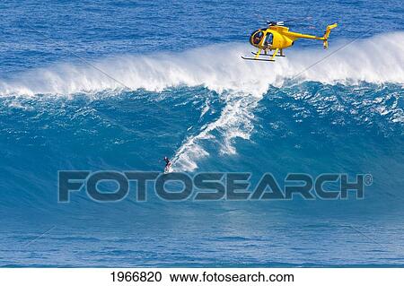 Hawaii, Maui, Peahi (Jaws), Helicopter, Surfer Rides A Giant Wave View Large Photo Image Stock Image - Hawaii, Maui, Peahi (Jaws), Helicopter, Surfer Rides A Giant Wave. Fotosearch