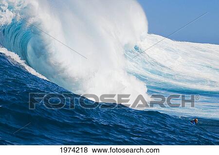 Stock Photo - Hawaii, Maui, Peahi Or Jaws, Surfer On A Huge Wave.. Fotosearch