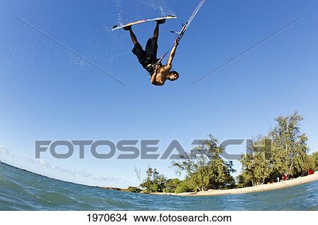 Picture - Hawaii, Maui, Professional Kiteboarder Shawn Richman Riding At Kitebeach. For Editorial Use Only.. Fotosearch