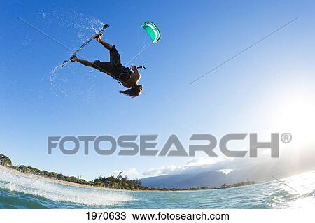 Stock Image - Hawaii, Maui, Professional Kiteboarder Shawn Richman Riding At Kitebeach. For Editorial Use Only.. Fotosearch