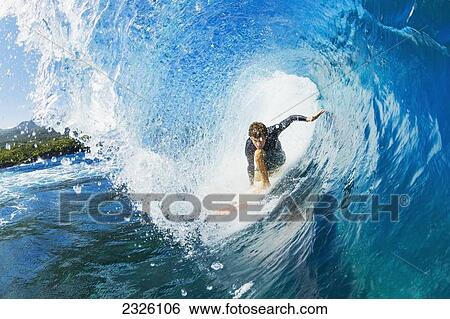 Hawaii, Maui, Professional Surfer Hank Gaskell In The Tube Of A Wave. Editorial Use Only. View Large Photo Image Stock Photograph - Hawaii, Maui, Professional Surfer Hank Gaskell In The Tube Of A Wave. Editorial Use Only.. Fotosearch
