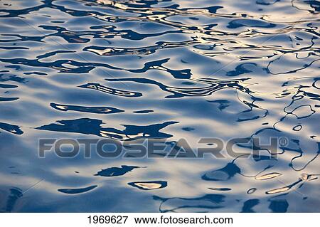 Stock Photo - Hawaii, Maui, Reflections In Turquoise Ocean Water.. Fotosearch