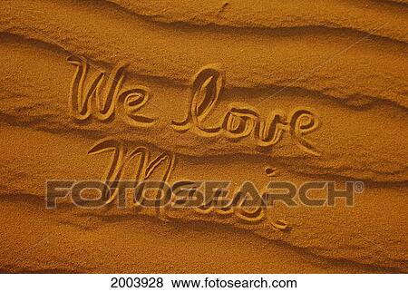 Hawaii, Maui, Sand Texture With We Love Maui Written In Script Golden Afternoon Light View Large Photo Image Stock Photo - Hawaii, Maui, Sand Texture With We Love Maui Written In Script Golden Afternoon Light. Fotosearch