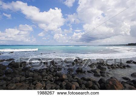 Stock Photo - Hawaii, Maui, Spreckelsville, Rocky Shore, Gorgeous Blue Ocean And Cloudy Sky. Fotosearch