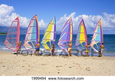 Hawaii, Maui, Spreckelsville, Six People Lined Up On Beach Sail Test, Back View View Large Photo Image Picture - Hawaii, Maui, Spreckelsville, Six People Lined Up On Beach Sail Test, Back View. Fotosearch