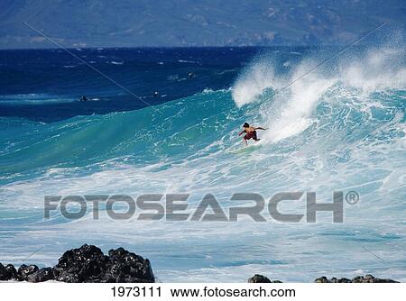 Stock Image - Hawaii, Maui, Surfer At Pavillions, Hookipa Beach Park.. Fotosearch