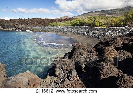 Stock Image - Hawaii, Maui, The remote Keawanaku Beach on the south side of Maui.. Fotosearch