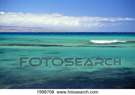 Stock Photo - Hawaii, Maui, Turquoise Ocean, Wave Break, Lanai Background, B1488. Fotosearch