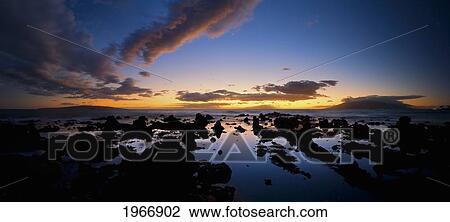 Stock Image - Hawaii, Maui, Twighlight Glow Off The Coast Of South Maui. Fotosearch