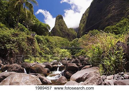 Stock Photo - Hawaii, Maui, View Of Iao Needle With Stream, Blue Sky, Clouds. Fotosearch