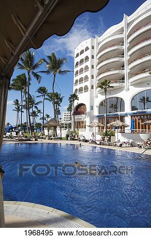 Stock Photography - Hawaii, Maui, Wailea, Fairmont Kea Lani Hotel, View Of The Pool With Hotel In The Background.. Fotosearch