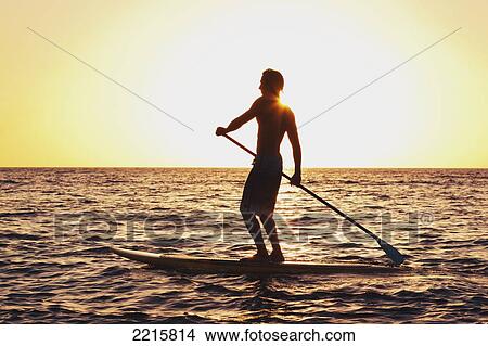 Hawaii, Maui, Wailea, Stand Up Paddeling at Sunset. View Large Photo Image Picture - Hawaii, Maui, Wailea, Stand Up Paddeling at Sunset.. Fotosearch