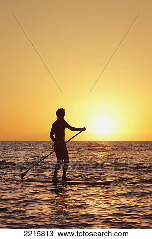 Hawaii, Maui, Wailea, Stand Up Paddeling at Sunset. View Large Photo Image Stock Image - Hawaii, Maui, Wailea, Stand Up Paddeling at Sunset.. Fotosearch