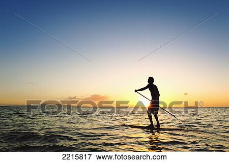 Hawaii, Maui, Wailea, Stand Up Paddeling at Sunset. View Large Photo Image Stock Photo - Hawaii, Maui, Wailea, Stand Up Paddeling at Sunset.. Fotosearch