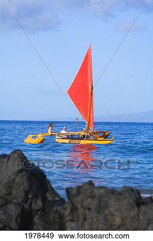 Hawaii, Maui, Wailea, Traditional Hawaiian Sailing Canoe Off Coastline. View Large Photo Image Stock Photo - Hawaii, Maui, Wailea, Traditional Hawaiian Sailing Canoe Off Coastline.. Fotosearch