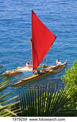 Hawaii, Maui, Wailea, Traditional Hawaiian Sailing Canoe Off Coastline. View Large Photo Image Stock Photo - Hawaii, Maui, Wailea, Traditional Hawaiian Sailing Canoe Off Coastline.. Fotosearch