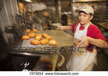 Hawaii, Maui, Wailuku, Home Made Bakery, Fresh Malasadas (Local Hawaiian Pastry. ) View Large Photo Image Picture - Hawaii, Maui, Wailuku, Home Made Bakery, Fresh Malasadas (Local Hawaiian Pastry. ). Fotosearch