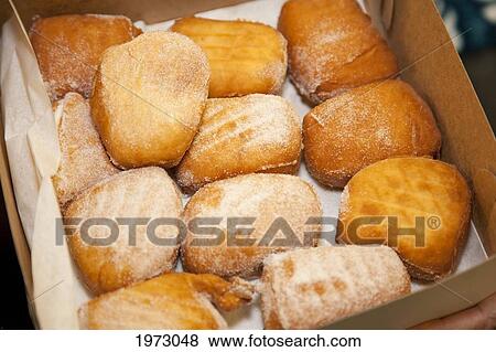 Stock Photo - Hawaii, Maui, Wailuku, Home Made Bakery, Fresh Malasadas (Local Hawaiian Pastry. ). Fotosearch