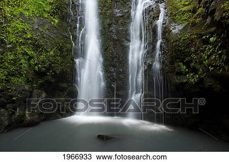 Stock Image - Hawaii, Maui, Waterfall Near Lush Waihe'e Valley. Fotosearch