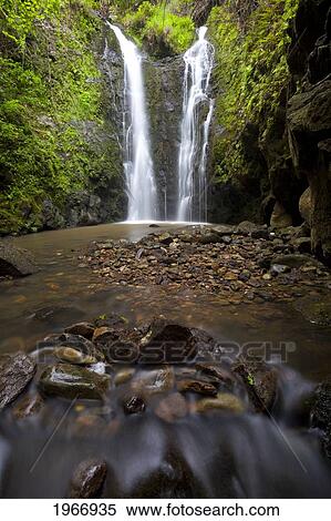 Stock Photography - Hawaii, Maui, Waterfall Near Lush Waihe'e Valley. Fotosearch