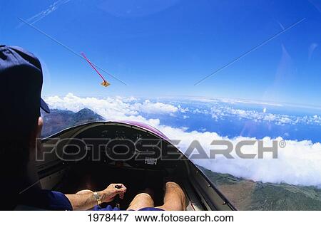 Hawaii, Maui, Yellow Glider Over Hana, View Of Pilot. View Large Photo Image Stock Photo - Hawaii, Maui, Yellow Glider Over Hana, View Of Pilot.. Fotosearch