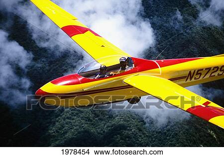 Hawaii, Maui, Yellow Glider With Two Passengers. View Large Photo Image Picture - Hawaii, Maui, Yellow Glider With Two Passengers.. Fotosearch