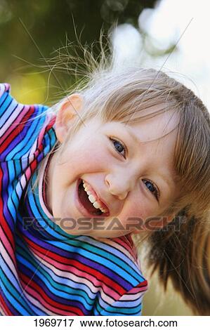 Stock Photo - Hawaii, Maui, Young Girl Posing For The Camera.. Fotosearch