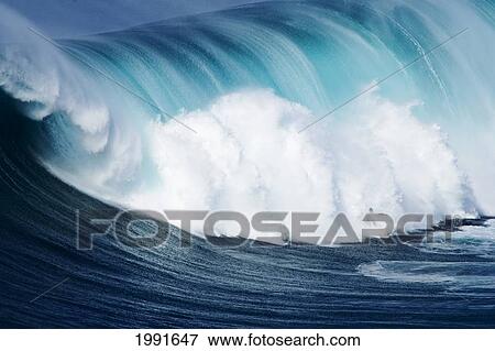 Stock Photo - Hawaii, Maui, Yuri Farrant Surfs Huge Wave At Jaws, Aka Peahi.. Fotosearch