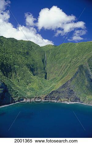 Hawaii, Molokai, Aerial North Coast, Green Mountains With Waterfall Blue Sky Clouds View Large Photo Image Stock Photography - Hawaii, Molokai, Aerial North Coast, Green Mountains With Waterfall Blue Sky Clouds. Fotosearch