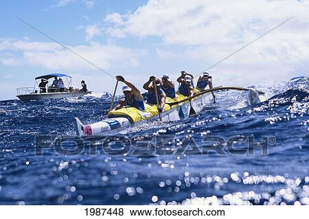 Hawaii, Molokai To Oahu, Kaiwi Channel, Women Paddling In Na Wahine O Kekai Race, Escort Boat In Background. No Model Release View Large Photo Image Stock Photo - Hawaii, Molokai To Oahu, Kaiwi Channel, Women Paddling In Na Wahine O Kekai Race, Escort Boat In Background. No Model Release. Fotosearch
