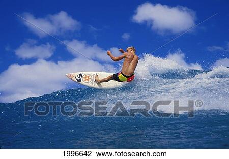 Hawaii, Noah Budroe Rips Off Top Of Wave With Board Facing Camera, Surfing View Large Photo Image Stock Image - Hawaii, Noah Budroe Rips Off Top Of Wave With Board Facing Camera, Surfing. Fotosearch