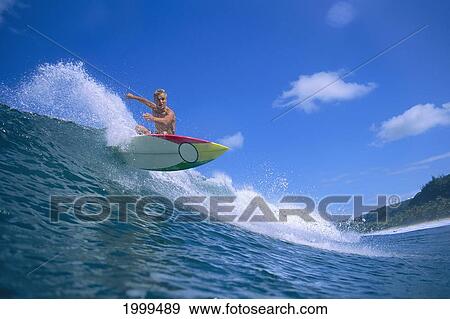 Hawaii, Noah Budroe Surfing, Cuts Over Wave, Looks At Camera, Blue Skies C1407 View Large Photo Image Stock Photo - Hawaii, Noah Budroe Surfing, Cuts Over Wave, Looks At Camera, Blue Skies C1407. Fotosearch