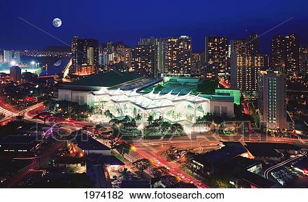 Stock Image - Hawaii, Oahu, Aerial Of Honolulu Convention Center At Dusk.. Fotosearch