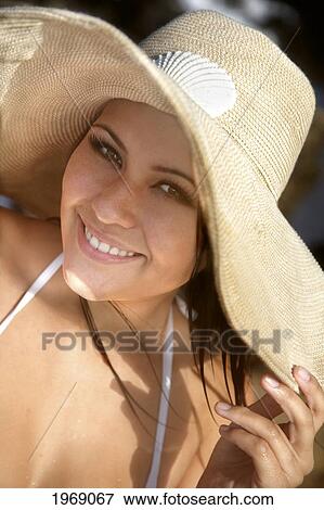 Hawaii, Oahu, Attractive Smiling Female Headshot Wearing A Sunhat View Large Photo Image Stock Photo - Hawaii, Oahu, Attractive Smiling Female Headshot Wearing A Sunhat. Fotosearch