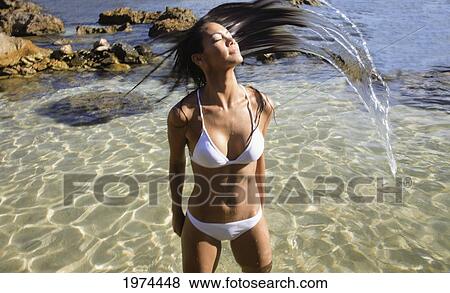 Hawaii, Oahu, Attractive Young Woman In The Water. View Large Photo Image Stock Photo - Hawaii, Oahu, Attractive Young Woman In The Water.. Fotosearch