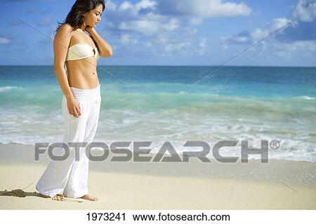 Hawaii, Oahu, Attractive Young Woman On The Beach. View Large Photo Image Stock Image - Hawaii, Oahu, Attractive Young Woman On The Beach.. Fotosearch