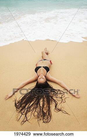 Hawaii, Oahu, Attractive Young Woman On The Beach. View Large Photo Image Stock Photo - Hawaii, Oahu, Attractive Young Woman On The Beach.. Fotosearch