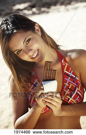 Hawaii, Oahu, Attractive Young Woman On The Beach With Chocolate. View Large Photo Image Stock Photograph - Hawaii, Oahu, Attractive Young Woman On The Beach With Chocolate.. Fotosearch