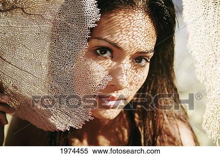 Stock Photography - Hawaii, Oahu, Attractive Young Woman On The Beach.. Fotosearch