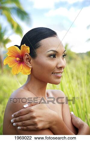 Hawaii, Oahu, Beautiful Local Female Smiling With A Hibiscus In Her Hair View Large Photo Image Stock Image - Hawaii, Oahu, Beautiful Local Female Smiling With A Hibiscus In Her Hair. Fotosearch