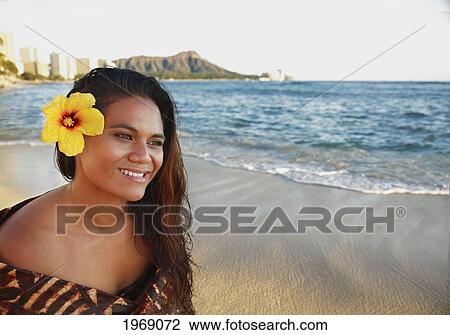 Stock Image - Hawaii, Oahu, Beautiful Local Polynesian Female Smiling On Waikiki Beach With Diamond Head In Background. Fotosearch