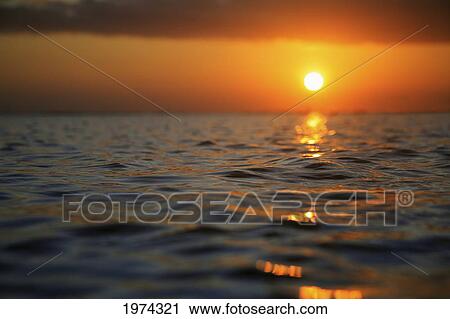 Hawaii, Oahu, Beautiful Sunset Over The Ocean. View Large Photo Image Stock Image - Hawaii, Oahu, Beautiful Sunset Over The Ocean.. Fotosearch