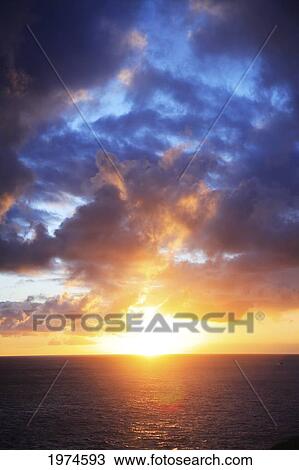 Stock Image - Hawaii, Oahu, Beautiful Sunset Over The Ocean.. Fotosearch
