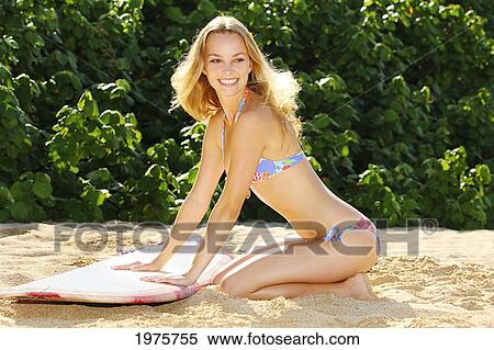 Stock Photography - Hawaii, Oahu, Beautiful Surfer Girl On The Beach.. Fotosearch