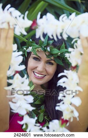 Hawaii, Oahu, Beautiful woman offering a lei. View Large Photo Image Stock Image - Hawaii, Oahu, Beautiful woman offering a lei.. Fotosearch