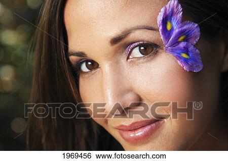 Hawaii, Oahu, Beautiful Young Portrait Of Female With Purple Floral Petals Near Her Eye. View Large Photo Image Stock Photograph - Hawaii, Oahu, Beautiful Young Portrait Of Female With Purple Floral Petals Near Her Eye.. Fotosearch