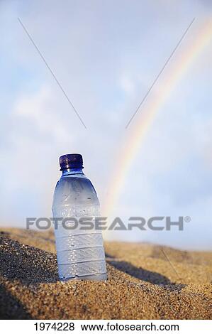 Hawaii, Oahu, Bottle Of Water On The Beach. View Large Photo Image Stock Photo - Hawaii, Oahu, Bottle Of Water On The Beach.. Fotosearch