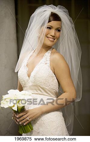 Hawaii, Oahu, Bride Posing At Her Wedding. View Large Photo Image Stock Photography - Hawaii, Oahu, Bride Posing At Her Wedding.. Fotosearch
