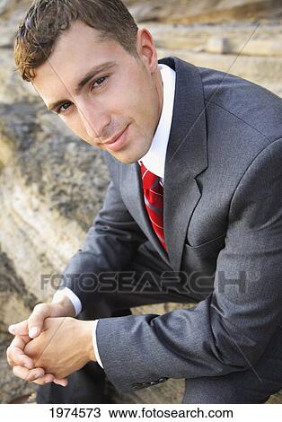 Hawaii, Oahu, Business Man In His Suit At Rocky Coastline. View Large Photo Image Stock Image - Hawaii, Oahu, Business Man In His Suit At Rocky Coastline.. Fotosearch